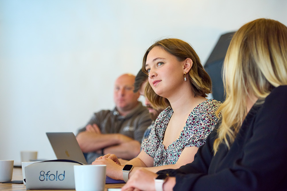 8fold team member in a meeting with colleagues